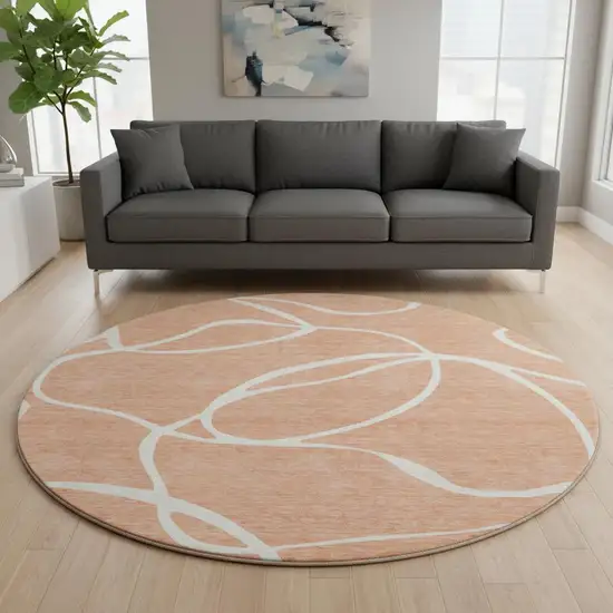 8' Salmon And Ivory Abstract Washable Round Rug With UV Protection Photo 2