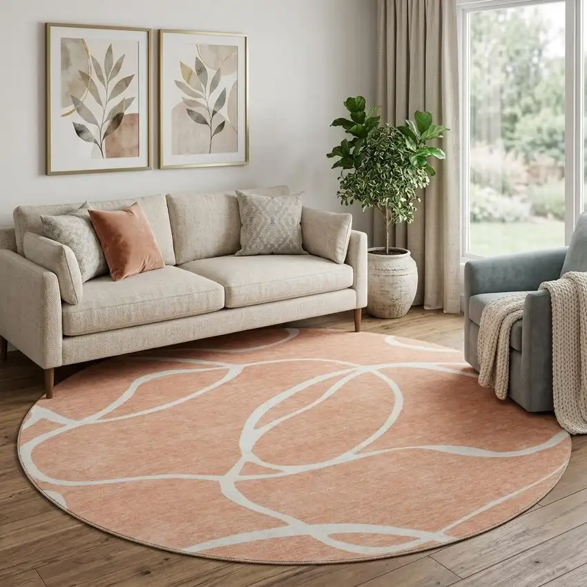 8' Salmon And Ivory Abstract Washable Round Rug With UV Protection Photo 1