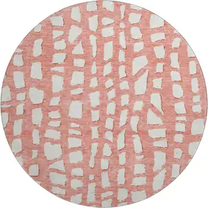 Photo of 8' Salmon And Ivory Cobblestone Washable Round Rug With UV Protection