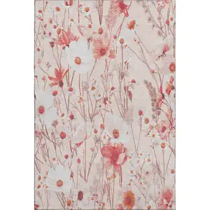 Photo of 8' Salmon And Ivory Floral Washable Area Rug With UV Protection