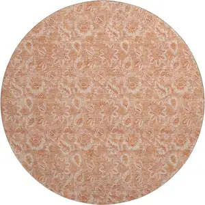 Photo of 8' Salmon And Ivory Floral Washable Round Rug With UV Protection