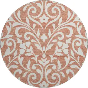 Photo of 8' Salmon And Ivory Floral Washable Round Rug With UV Protection