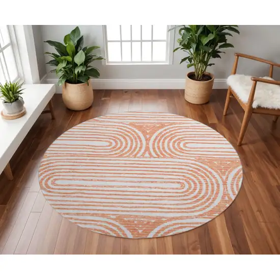 8' Salmon And Ivory Geometric Washable Round Rug With UV Protection Photo 2