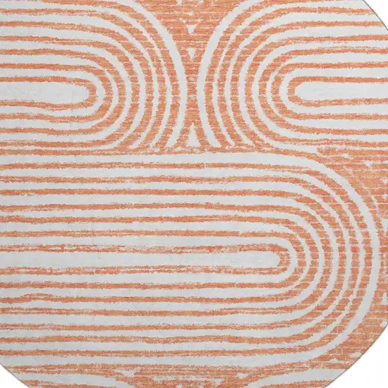 8' Salmon And Ivory Geometric Washable Round Rug With UV Protection Photo 3