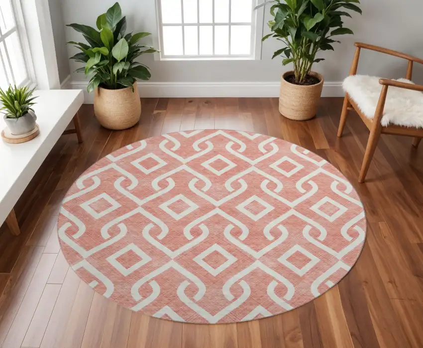 8' Salmon And Ivory Geometric Washable Round Rug With UV Protection Photo 2