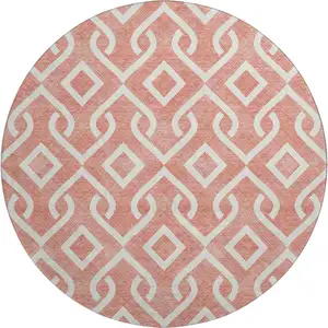 Photo of 8' Salmon And Ivory Geometric Washable Round Rug With UV Protection