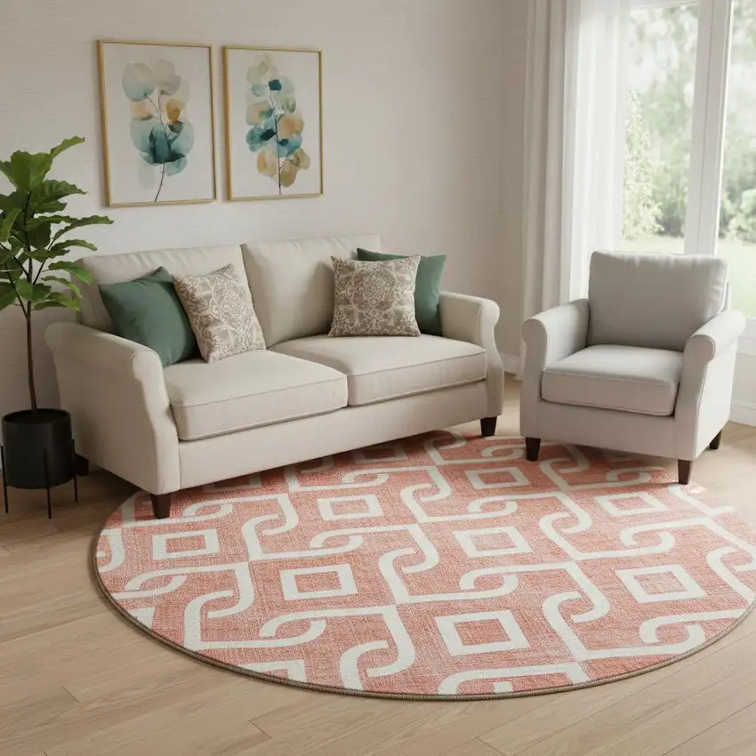 8' Salmon And Ivory Geometric Washable Round Rug With UV Protection Photo 1