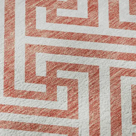 8' Salmon And Ivory Geometric Washable Round Rug With UV Protection Photo 9