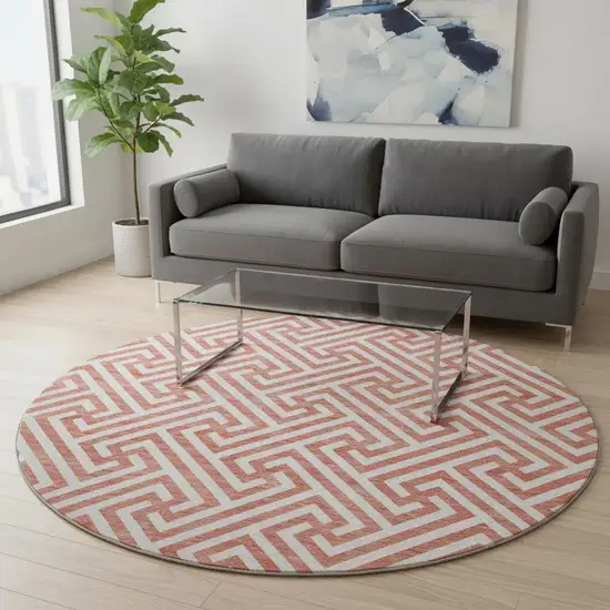 8' Salmon And Ivory Geometric Washable Round Rug With UV Protection Photo 2