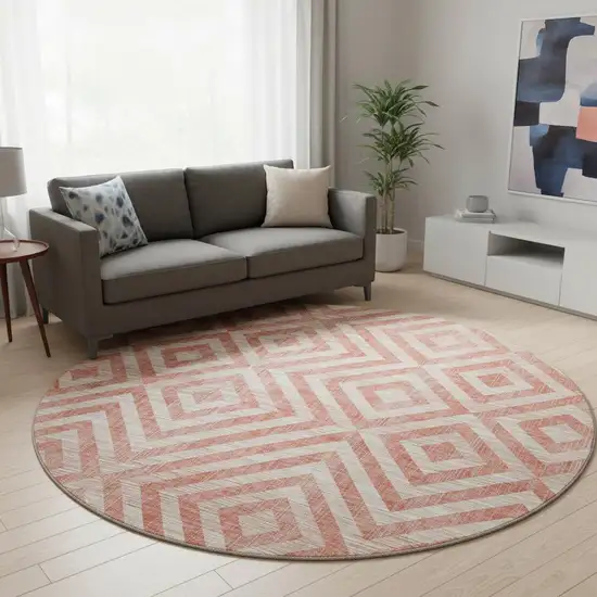 8' Salmon And Ivory Geometric Washable Round Rug With UV Protection Photo 2