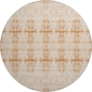 Photo of 8' Salmon And Ivory Geometric Washable Round Rug With UV Protection