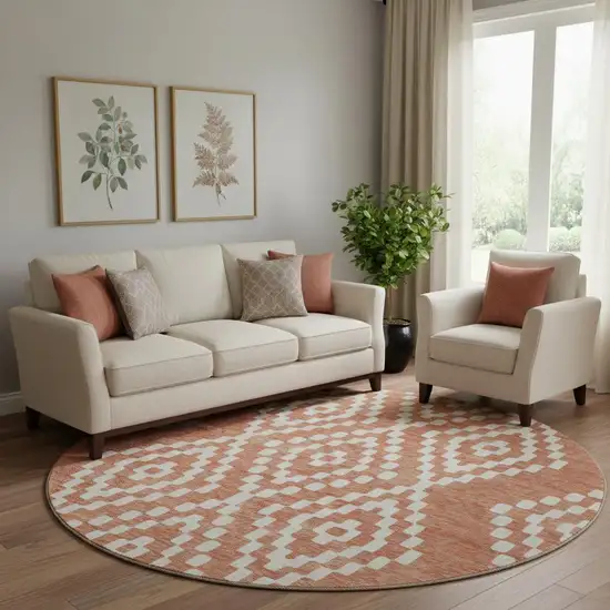 8' Salmon And Ivory Geometric Washable Round Rug With UV Protection Photo 1