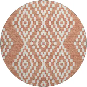 Photo of 8' Salmon And Ivory Geometric Washable Round Rug With UV Protection