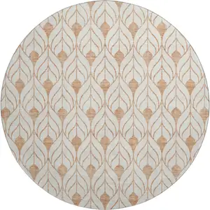 Photo of 8' Salmon And Ivory Geometric Washable Round Rug With UV Protection