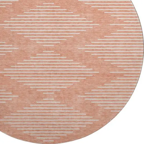 8' Salmon And Ivory Geometric Washable Round Rug With UV Protection Photo 2