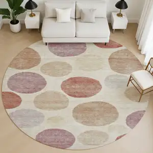 Photo of 8' Salmon And Ivory Geometric Washable Round Rug With UV Protection