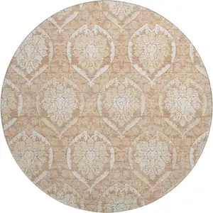 Photo of 8' Salmon And Ivory Medallion Washable Round Rug With UV Protection