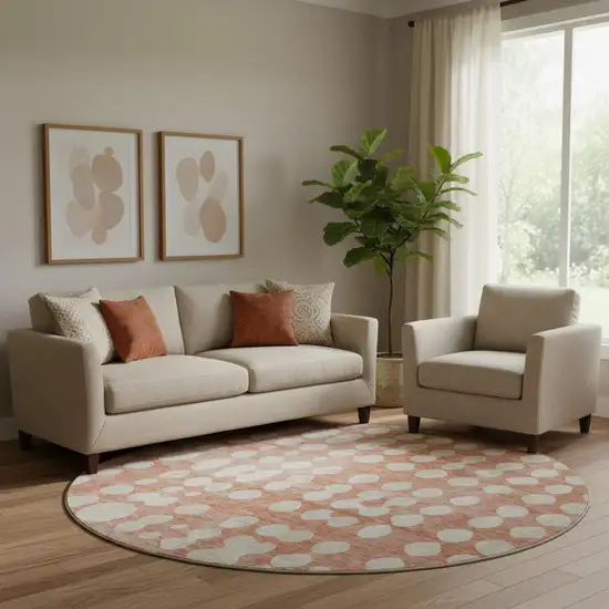 8' Salmon And Ivory Polka Dot Washable Round Rug With UV Protection Photo 1
