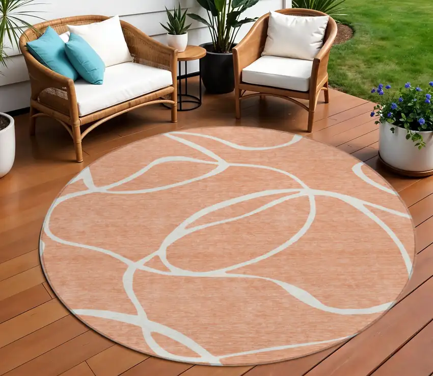 8' Salmon And Ivory Round Abstract Washable Indoor Outdoor Area Rug Photo 1