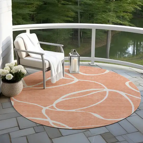 8' Salmon And Ivory Round Abstract Washable Indoor Outdoor Area Rug Photo 7