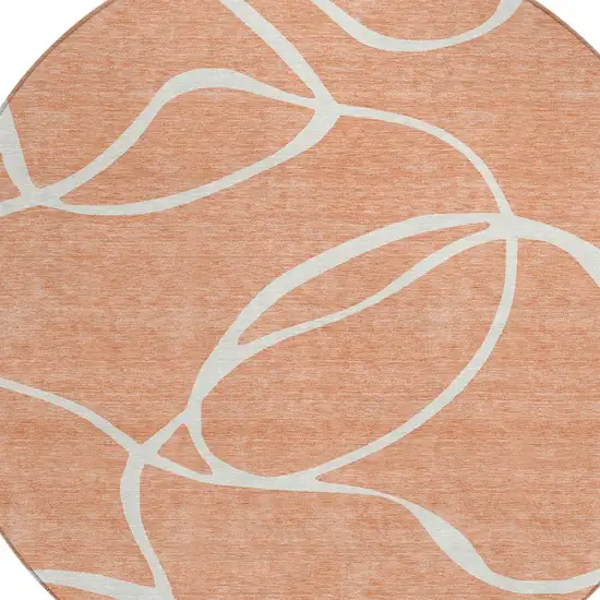 8' Salmon And Ivory Round Abstract Washable Indoor Outdoor Area Rug Photo 4
