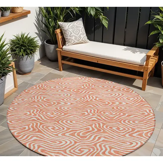 8' Salmon And Ivory Round Abstract Washable Indoor Outdoor Area Rug Photo 1