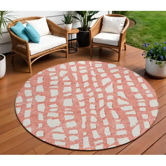 8' Salmon And Ivory Round Abstract Washable Indoor Outdoor Area Rug Photo 1