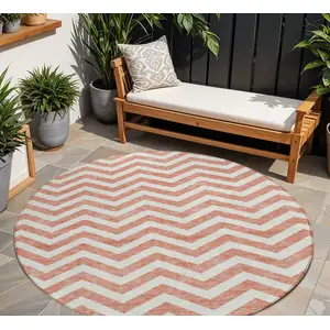 Photo of 8' Salmon And Ivory Round Chevron Washable Indoor Outdoor Area Rug