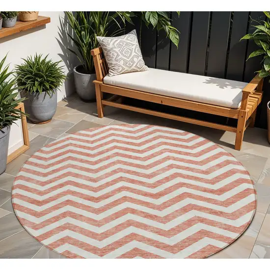 8' Salmon And Ivory Round Chevron Washable Indoor Outdoor Area Rug Photo 1