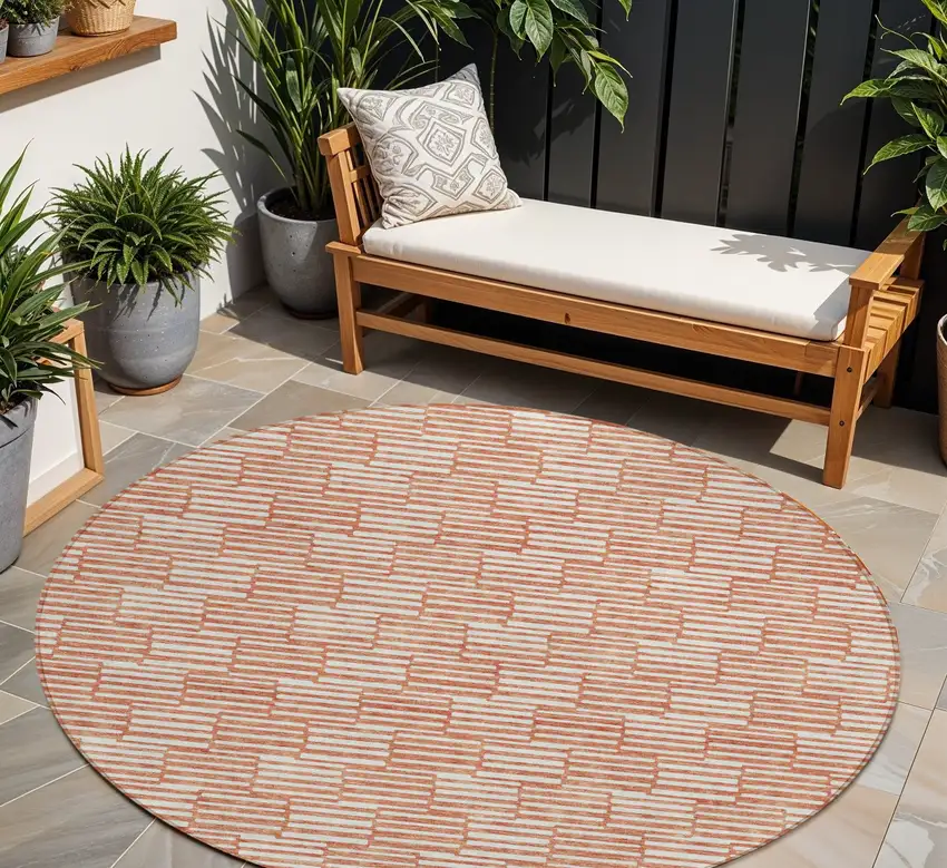8' Salmon And Ivory Round Geometric Washable Indoor Outdoor Area Rug Photo 1