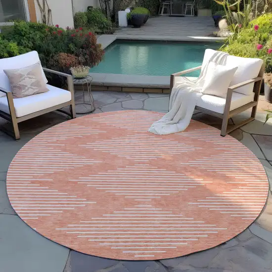 8' Salmon And Ivory Round Geometric Washable Indoor Outdoor Area Rug Photo 6
