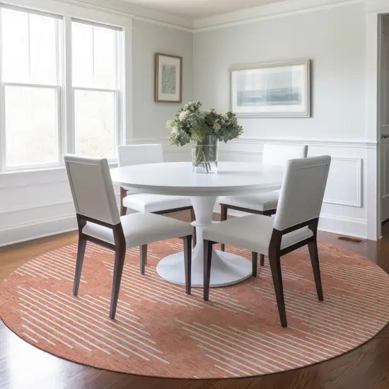 8' Salmon And Ivory Round Geometric Washable Indoor Outdoor Area Rug Photo 7