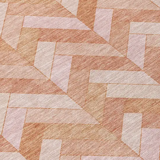 8' Salmon And Ivory Round Geometric Washable Indoor Outdoor Area Rug Photo 8