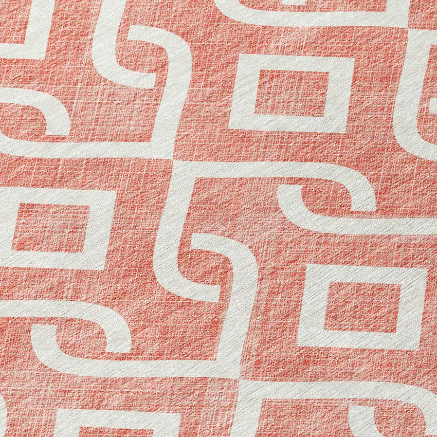 8' Salmon And Ivory Round Geometric Washable Indoor Outdoor Area Rug Photo 4