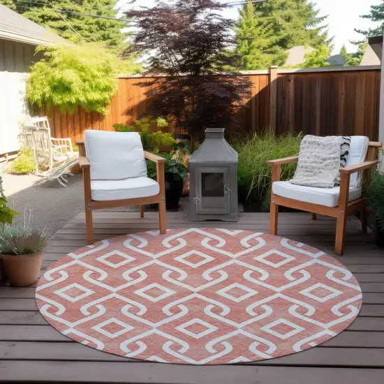 8' Salmon And Ivory Round Geometric Washable Indoor Outdoor Area Rug Photo 6