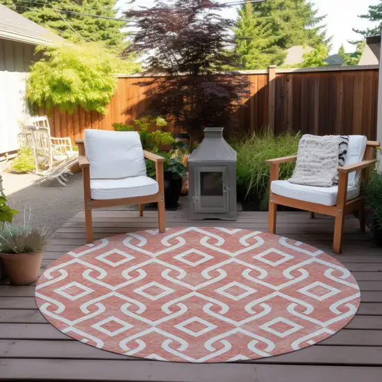 8' Salmon And Ivory Round Geometric Washable Indoor Outdoor Area Rug Photo 6