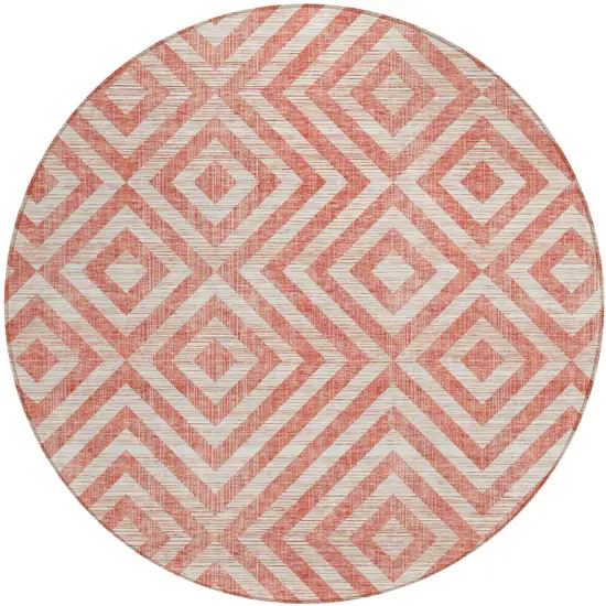 8' Salmon And Ivory Round Geometric Washable Indoor Outdoor Area Rug Photo 1