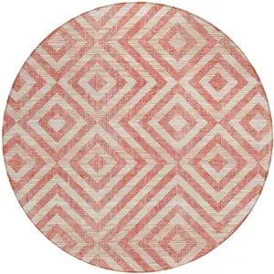 Photo of 8' Salmon And Ivory Round Geometric Washable Indoor Outdoor Area Rug