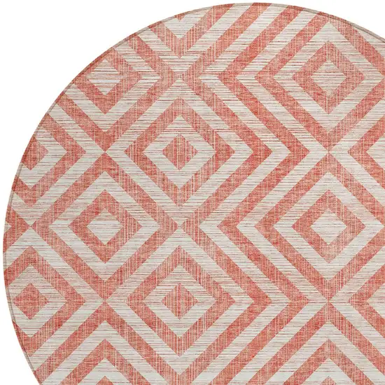 8' Salmon And Ivory Round Geometric Washable Indoor Outdoor Area Rug Photo 5