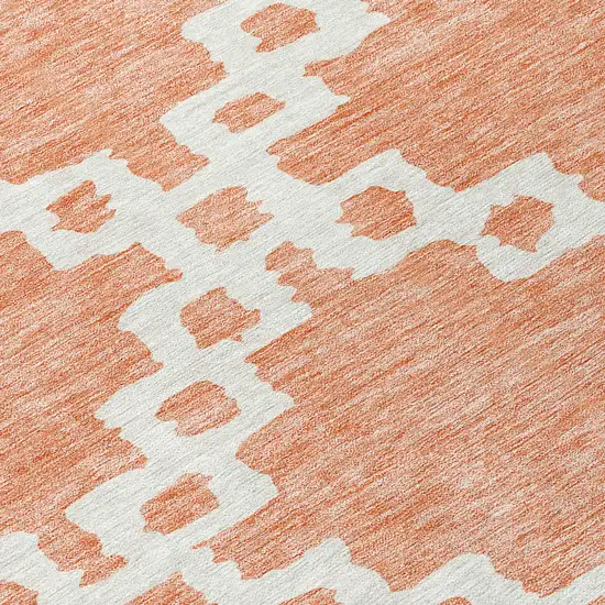 8' Salmon And Ivory Round Geometric Washable Indoor Outdoor Area Rug Photo 8
