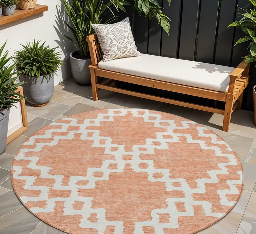 8' Salmon And Ivory Round Geometric Washable Indoor Outdoor Area Rug Photo 1