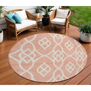 Photo of 8' Salmon And Ivory Round Trellis Washable Indoor Outdoor Area Rug