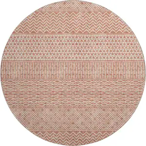 Photo of 8' Salmon And Ivory Striped Washable Round Rug With UV Protection