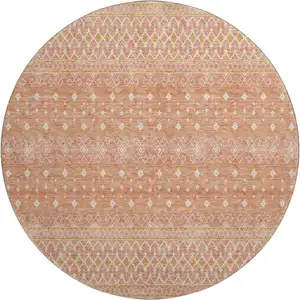 Photo of 8' Salmon And Ivory Tribal Washable Round Rug With UV Protection