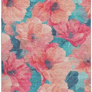 Photo of 8' Salmon And Teal Floral Washable Area Rug With UV Protection