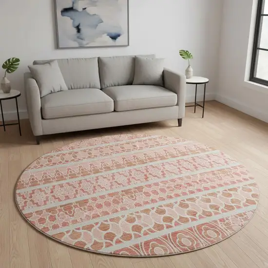 8' Salmon Beige And Ivory Ikat Washable Round Rug With UV Protection Photo 2