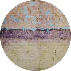 Photo of 8' Salmon Blue And Gold Abstract Washable Round Rug With UV Protection