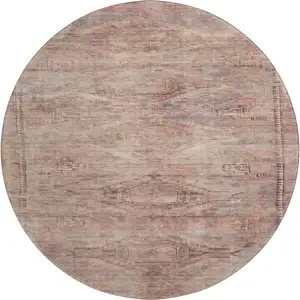 Photo of 8' Salmon Copper And Beige Abstract Geometric Washable Round Rug With UV Protection