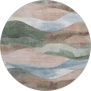 Photo of 8' Salmon Emerald And Ivory Abstract Washable Round Rug With UV Protection