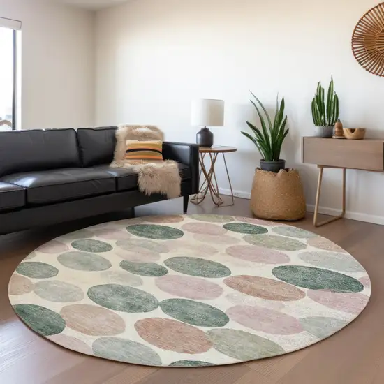 8' Salmon Green And Peach Round Geometric Washable Indoor Outdoor Area Rug Photo 7